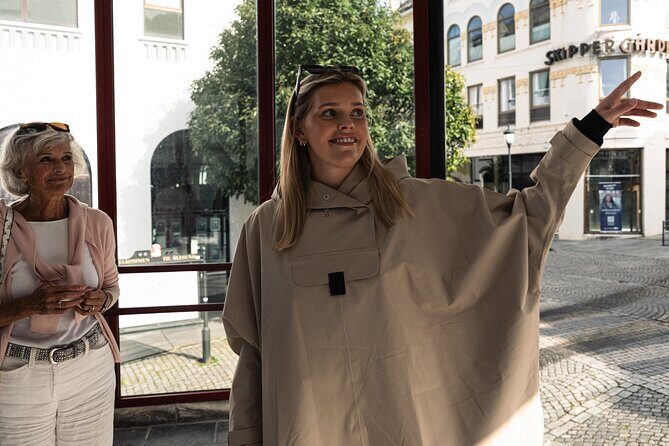 3 Hour Guided Food Walk Tour in Alesund, Norway - Stuen AS: trying svinemør, a local sausage classic