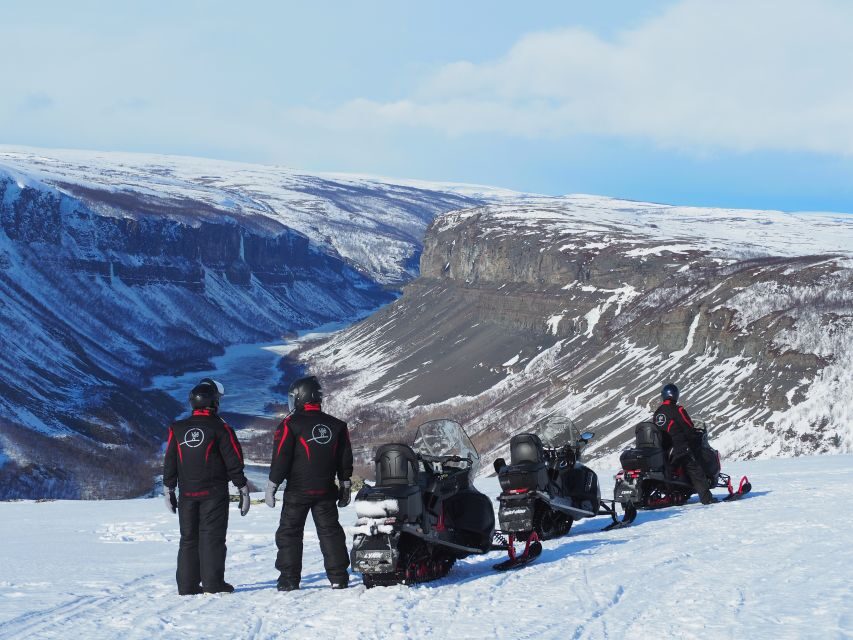 Alta: Guided Snowmobile Safari on Finnmarksvidda With Snacks - Arctic life spotting: reindeer, sleds, and ski tracks