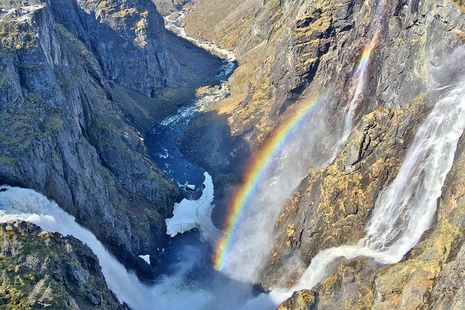 AMAZING HARDANGER FJORD: Private guided round trip from Bergen, 10 hours - Fossen Bratte (79 m): Walk to the Base for the Full Effect