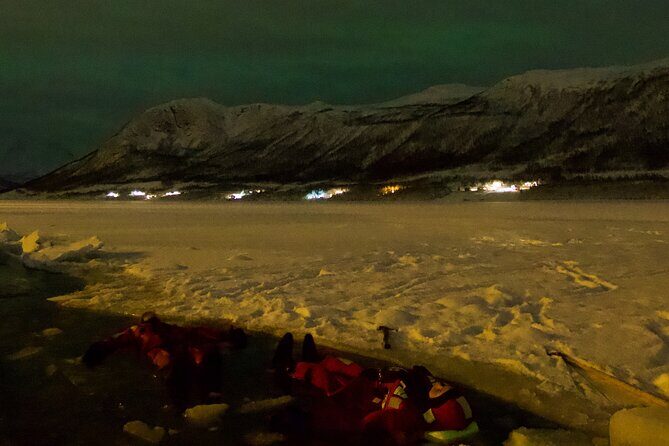 Arctic Ocean Night Floating in Ramfjord - The Fjord Cabin After: Hot Drinks, Cinnamon Rolls, and Photo Help
