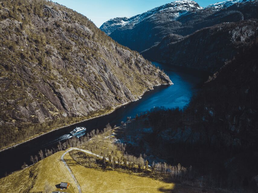 Bergen: Mostraumen Fjord Cruise - with Local Tour Guides - Mostraumen Strait and Channel: Steep Cliffs, Waterfall Sound, and Close-Up Views
