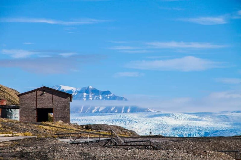 From Longyearbyen: Pyramiden Private Photo Tour w/ Transfer - Pyramiden’s Soviet architecture: why the photos feel different here