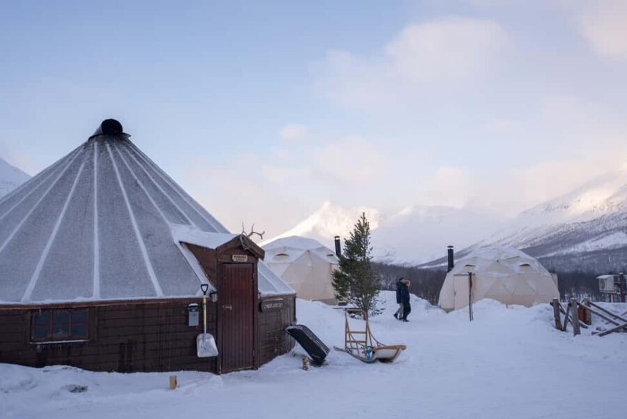 From Tromsø: Advanced Dog Sledding Daytime & Snow Park Visit - Warm up in the Sámi lávvu with a hot meal by the fire