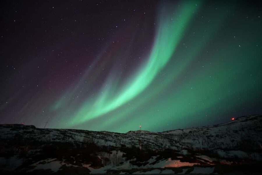 From Tromsø: Aurora Bus Tour with Snacks, Photos, and Drinks - Where you start in Tromsø: a simple meeting point in the city