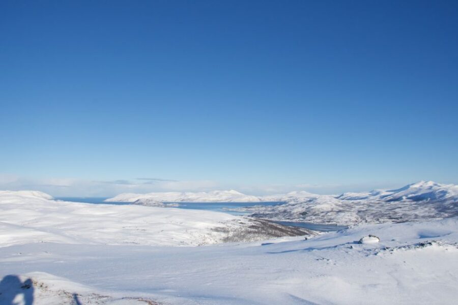 From Tromsø: Daytime Snowshoe Experience with stunning views - From Tromsø pick-up to camp: why the timing feels right