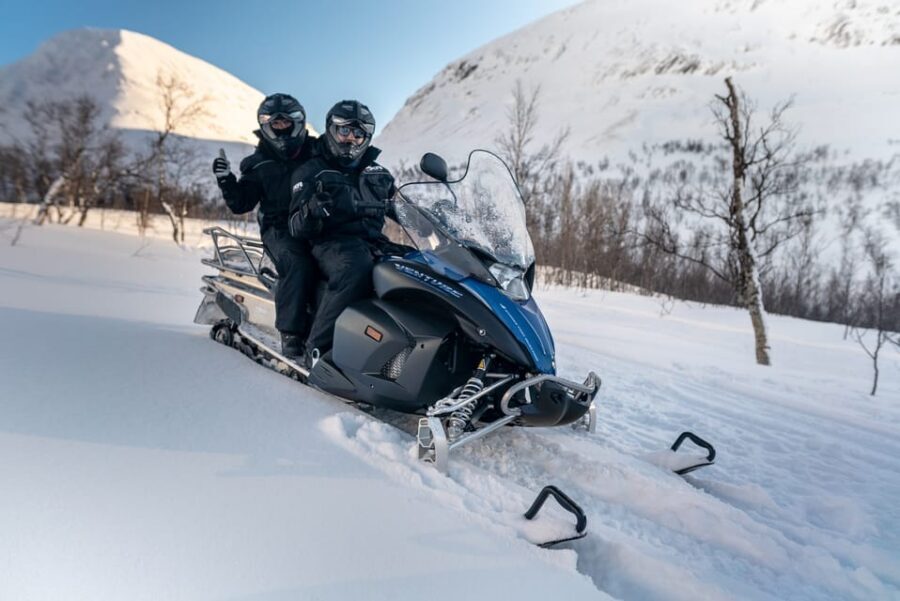 From Tromsø: Snowmobiling Tour at Camp Tamok - Camp Tamok in a Lávvu: Stew by Firelight and Sámi Atmosphere