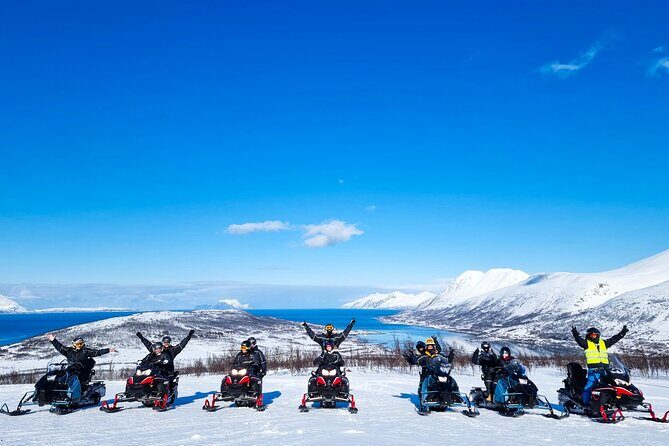 Guided Lyngen Alps Snowmobile Tour From Tromso - Gear up fast: suits, helmets, and the driver license rule