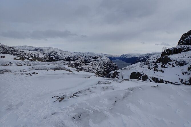 Guided winter hike to Pulpit Rock Preikestolen - Lysefjord stop: a scenic pause before Pulpit Rock