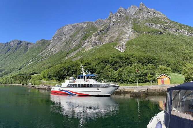Hjørundfjord Fjord Tour Roundtrip from Ålesund - Vegsund strait pass: boathouses and the first fjord mood shift