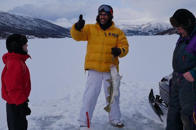 Ice Fishing On The Fjord - Basecamp at the Lyngen Alps: where the day turns from cold to cozy
