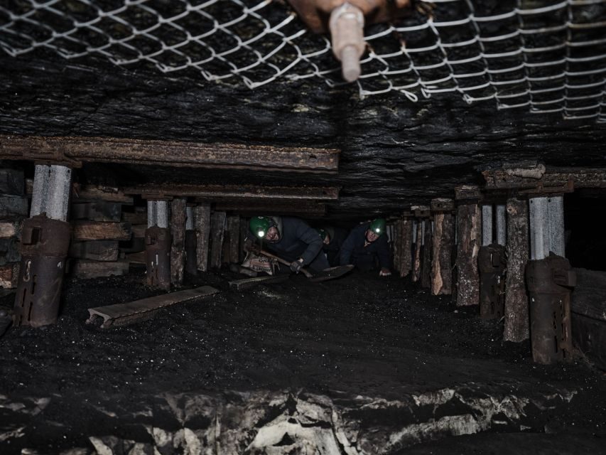 Longyearbyen: Historic Coal Mine Tour at Gruve 3 - Entering the main tunnel (1970s) and the long inner walk