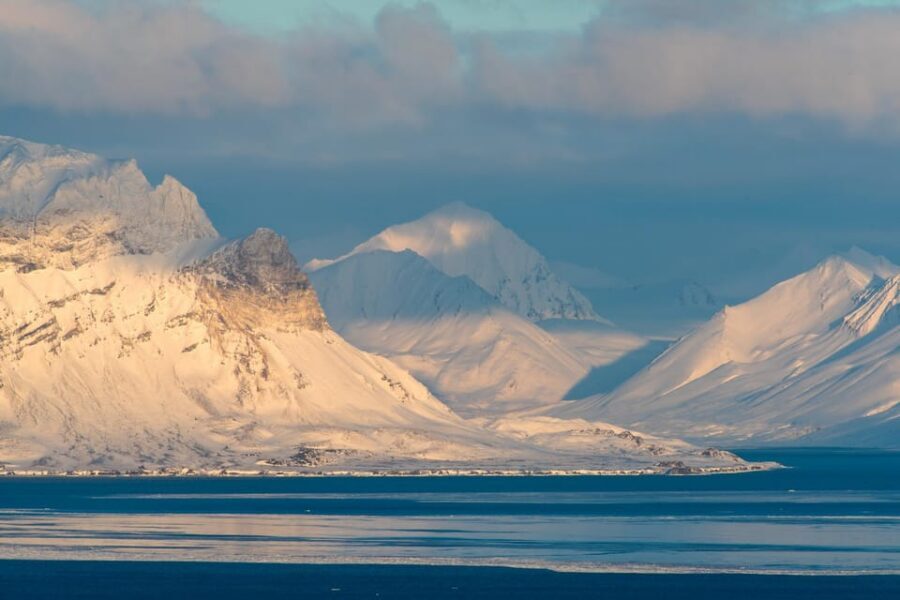 Longyearbyen: Snowmobile Tour to Barentsburg with Lunch - From Pickup to Safety Briefing in Longyearbyen