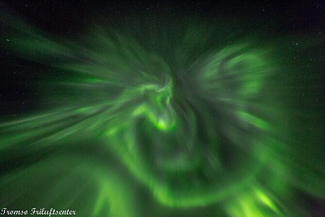 Northern Lights Chase with Authentic North Norwegian Charm - Entering Tromsø at Northern Lights Speed