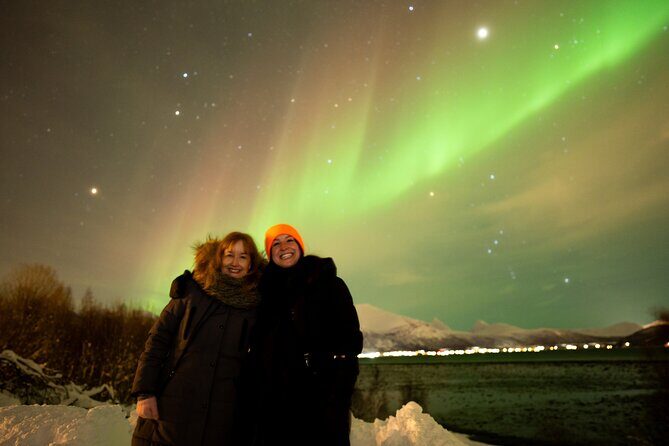 Northern Lights Tour with Local Guide and Photos - Aurora spotting in Troms: camp warmth, photo help, and real patience