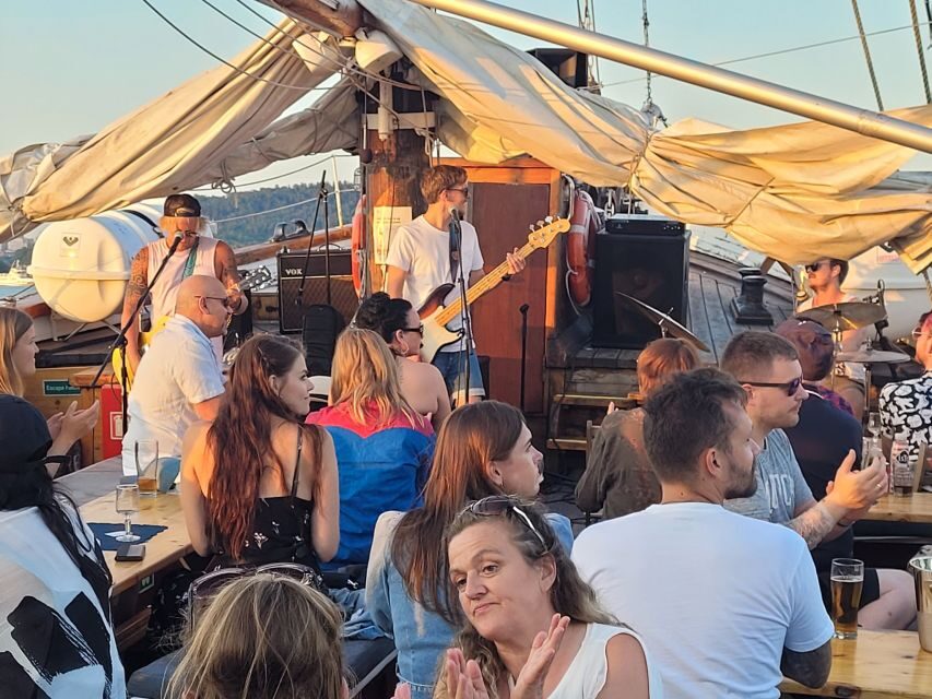 Oslo Fjord Evening Live Rock music cruise with Shrimp buffet - What the first moments feel like on an open wooden sailing boat