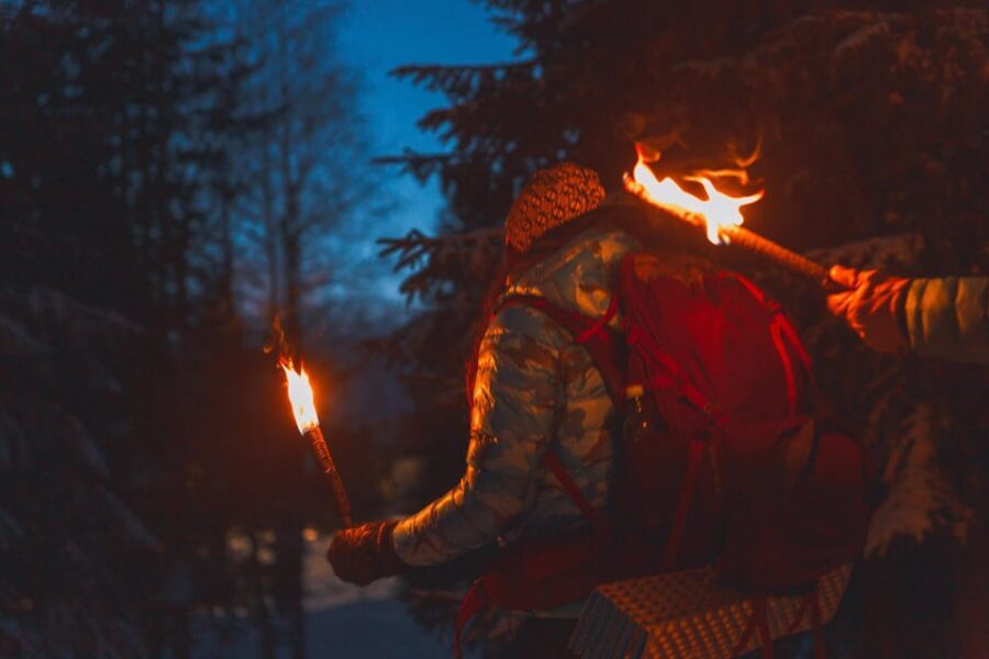 Oslo: Snowy Forest Torchlight Walk with Campfire - Entering Oslo’s winter night: meeting by Backstube Opera
