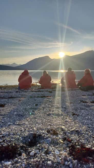 Senja: Guided Small Group Evening Kayaking Tour - The water and the views: calmer bays, remote beaches, and photo-friendly moments