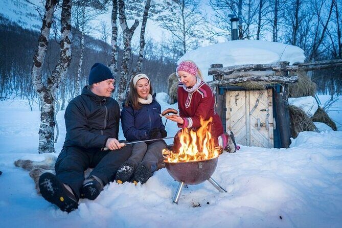 Sjursnes Arctic Ice Fishing Adventure from Tromso - The Hidden Valley Camp: Drilling Holes and Settling In