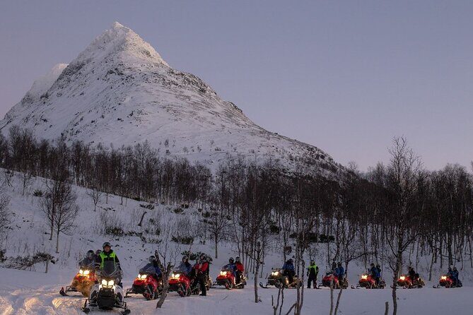 Snowmobile Evening Adventure outside Tromsø - Evening Timing Makes This Feel Special