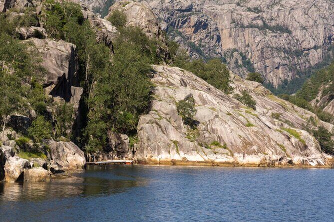 Stavanger: Waterfalls, Caves and Rock Tour By Sea - Boat comfort: sundeck, kiosk snacks, and hearing the narration