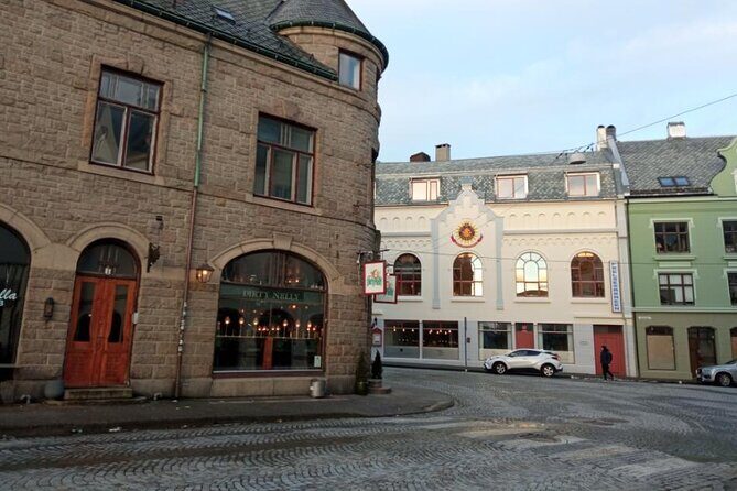 The Essence of Ålesund Self-Guided Walking Tour - Skansengata: wooden houses, views, and a calm stretch