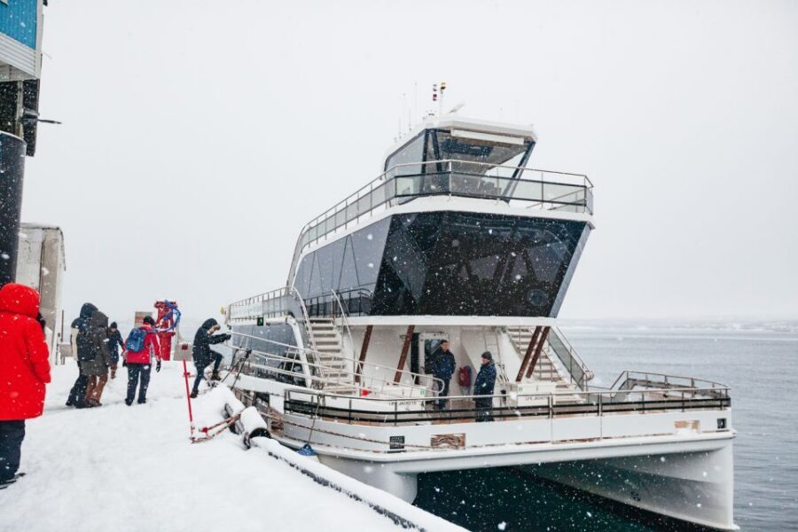 Tromsø: Arctic Fjord Cruise With Stop On Land At Fish Racks - Food and drinks onboard: warm breaks, small extras, and what costs extra