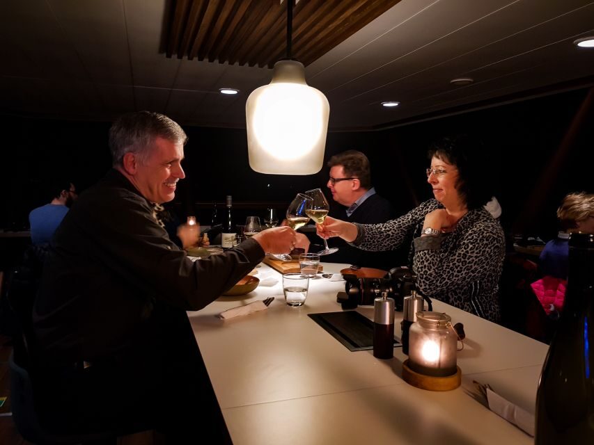 Tromsø: Aurora Dinner Cruise by Hybrid-Electric Catamaran - Dessert on the next view stop, with the aurora hunt in full swing