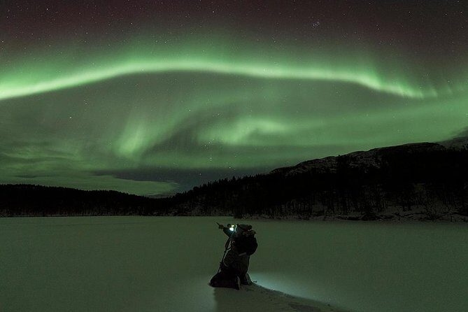 Tromso Aurora Hunt with Bonfire, Soup, Winter Gear & Transfers - What This Tromsø Aurora Hunt Feels Like at Night