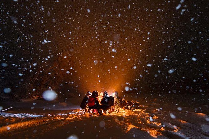 Tromso Aurora Hunt with Bonfire, Soup, Winter Gear & Transfers - Thermal Suits and Boots: Gear That Changes Your Odds of Enjoying the Night