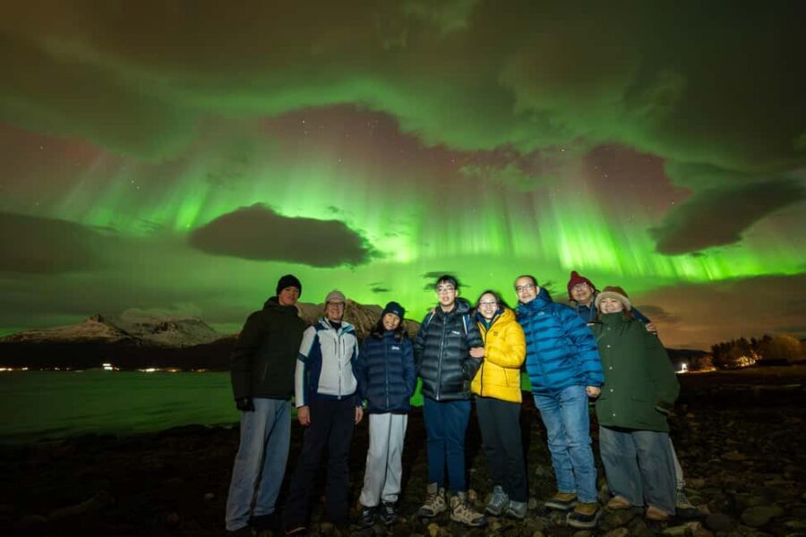 Tromsø: Northern Lights Chase, Local Guide, Foods & Pictures - The secret stop: photo time, guided stories, and the warm campfire wait
