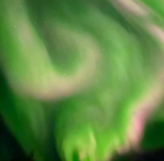 Tromsø: Northern Lights Chase — Small Group Experience - Campfire Calm: Reindeer Hides, Hot Drinks, and Norwegian Snacks