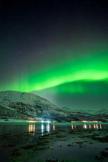 Tromsø: Northern Lights in a Minivan with Free Photos and a Hot Meal - Small-group energy: easier help, safer winter driving