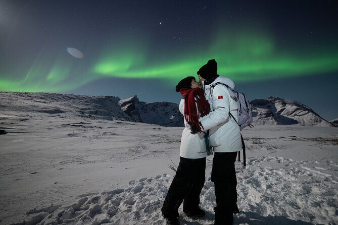 Tromsø: Northern Lights Minibus Tour with Expert Guides - Stop Tromsø: thermal suits, snacks, and the campfire rhythm
