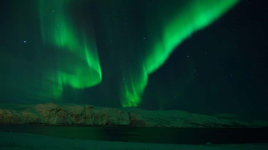 Tromsø: Northern Lights Tour in Glass Minibus with Dinner - How the glass-roof bus changes the whole Northern Lights hunt
