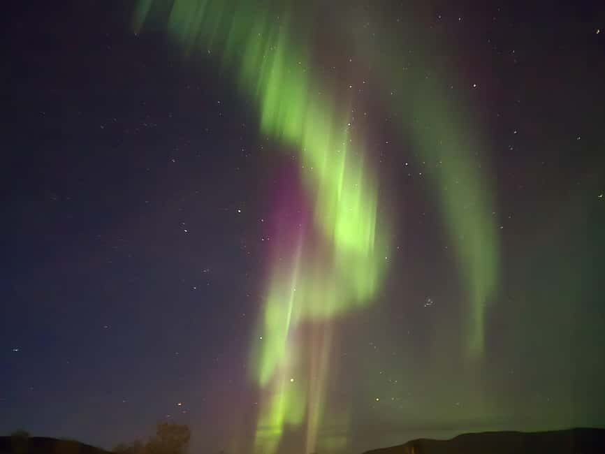Tromsø: Northern Lights Tour in Glass Minibus with Dinner - Dinner by the fire: more than a snack stop