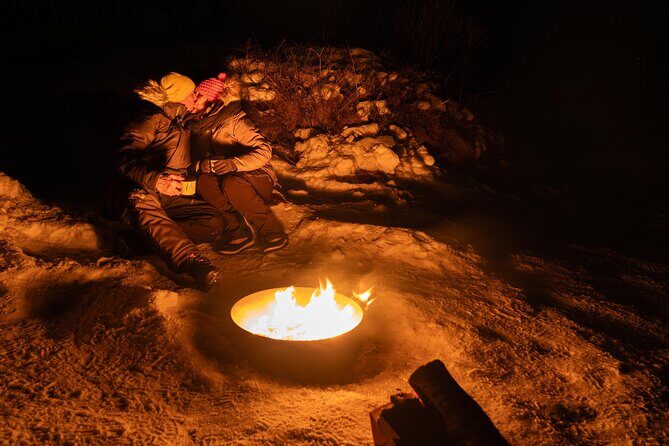 Tromsø Northern Lights with Campfire and Professional Photos - Weather Gear Matters: Thermo Suit, Hand Warmers, and Spikes