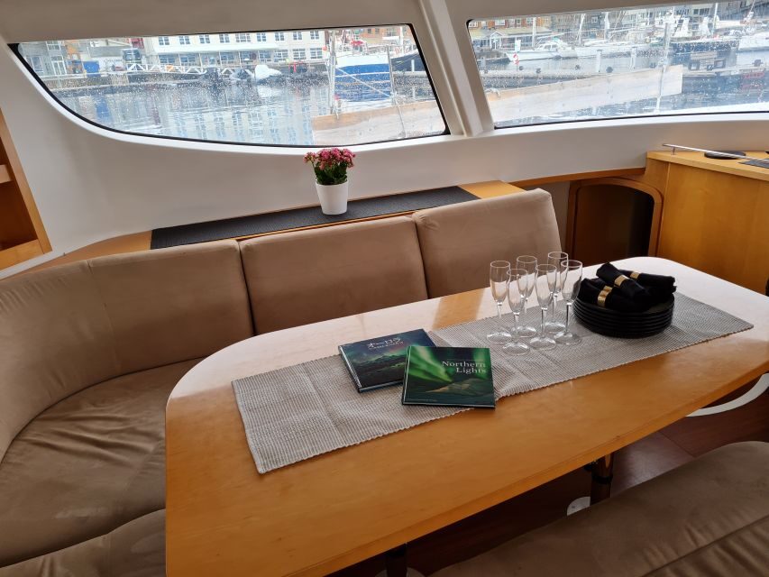 Tromso: Sightseeing Cruise by Catamaran with Snacks & Drinks - Tromsø History While You Sail: Tirpitz, Fishing, Kvaløya, War, and Today