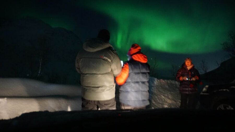 Tromsø: Small group Aurora Borealis - Warm overalls, campfire snacks, and staying comfortable